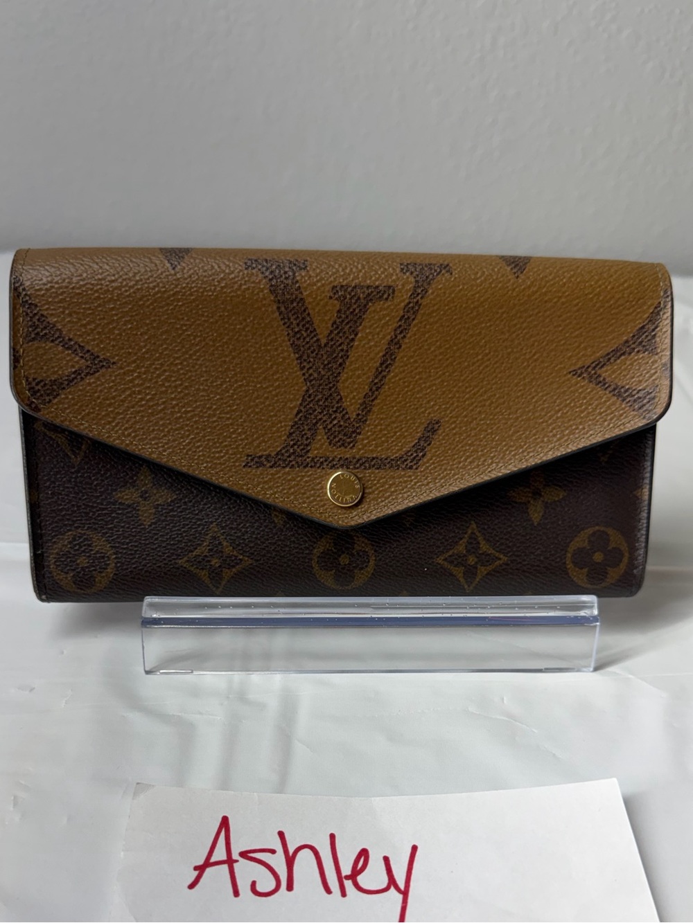Louis Vuitton Sarah wallet in reverse monogram